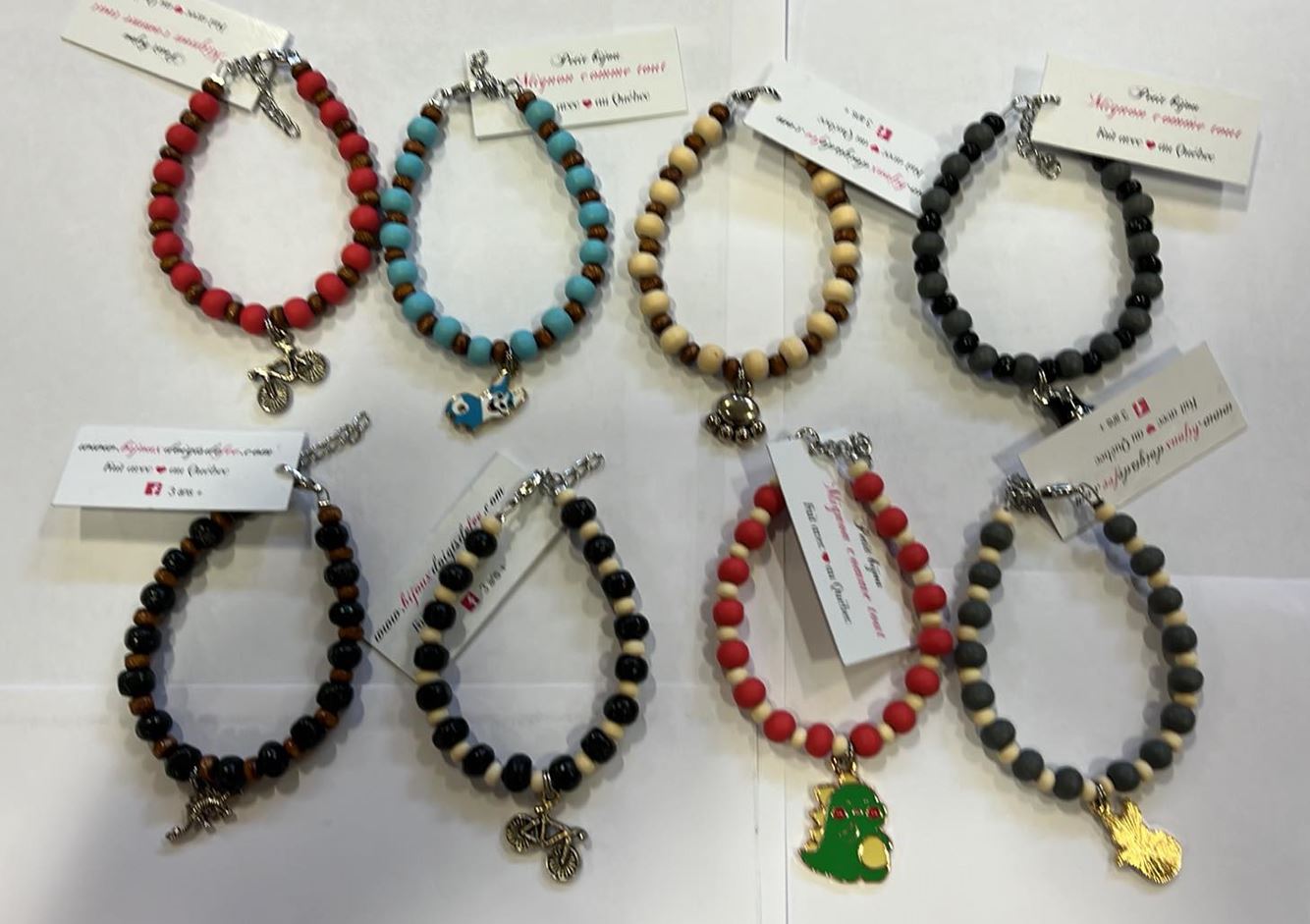 FANCY BRACELETS AND ASSORTED CHARMS