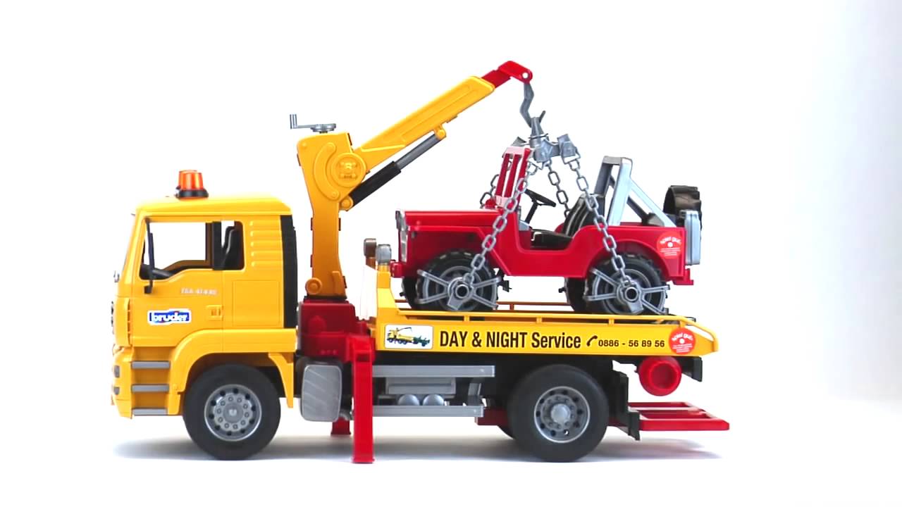 BRUDER - MAN TGA YELLOW TOW TRUCK WITH CRANE AND RED JEEP #02750