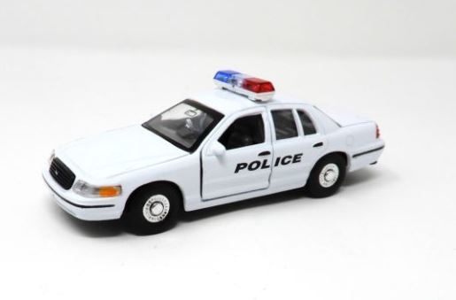 WHITE FORD POLICE CAR