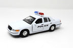 WHITE FORD POLICE CAR