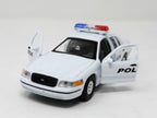 WHITE FORD POLICE CAR